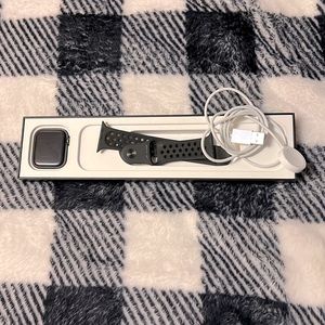 This is a New Apple Watch Series 7 se Nike 44mm space grey aluminum